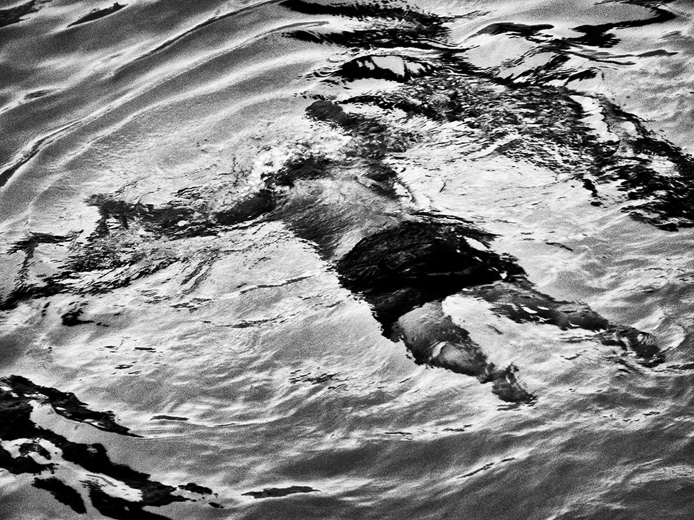 Daido Moriyama Black and White Photograph of Man Swimming