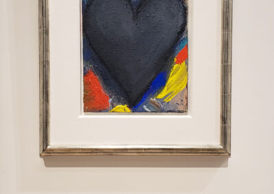 Installation view of Jim Dine painting with black heart and colorful background
