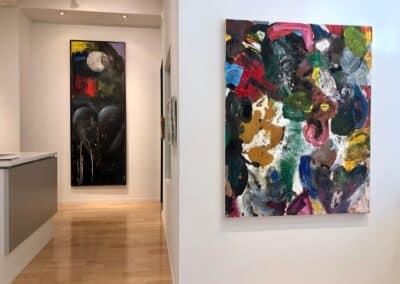 Foreground: install shot of abstract Jim Dine painting, Background: install shot of large Jim Dine heart and moon painting